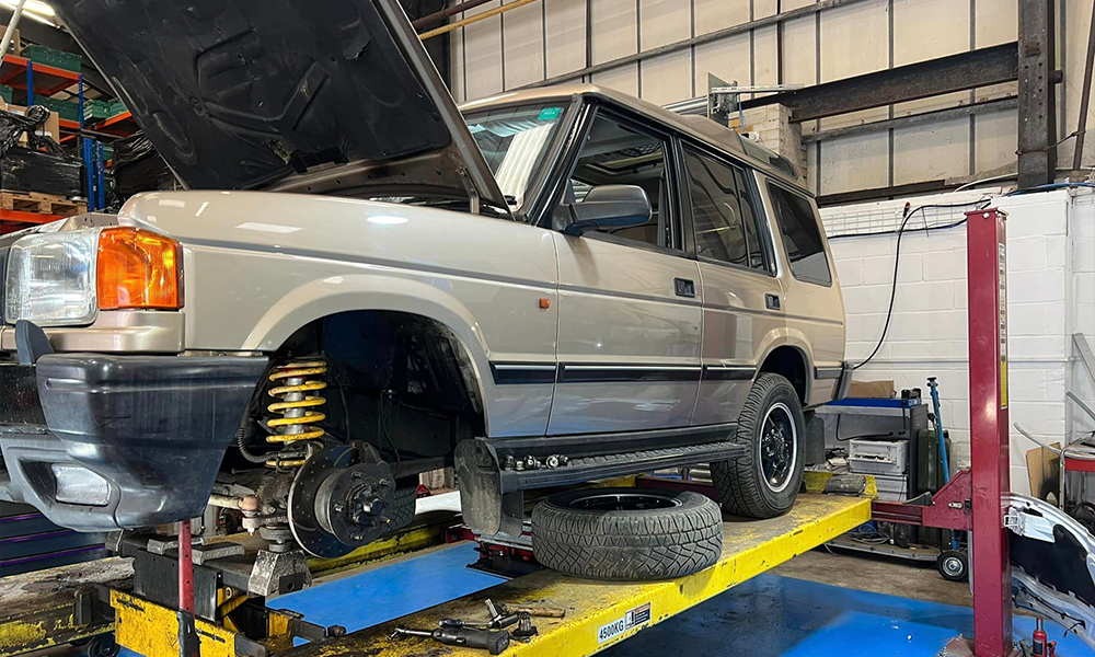 Land Rover clutch components undergoing repair and maintenance at AJ 4X4 