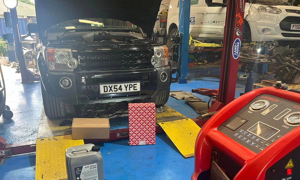 Land Rover clutch components undergoing repair and maintenance at AJ 4X4 