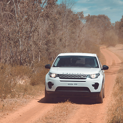 Land Rover Discovery navigating an offroad trail serviced by AJ 4X4 